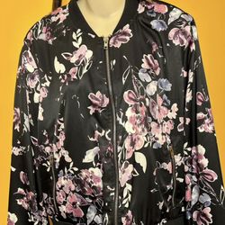 New women's multicolored bumper. Size L. $35.