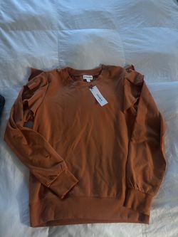 Bran new copper sweater