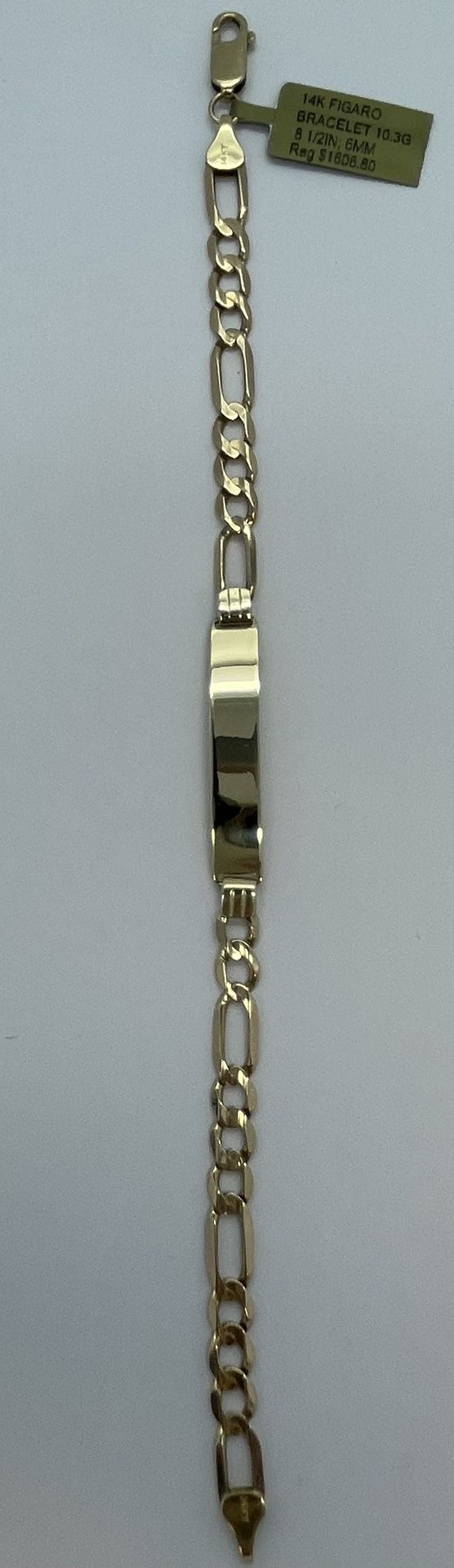14K Gold Figaro Bracelet.