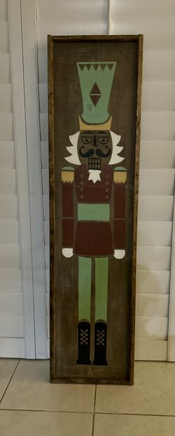 Decorative wooden nutcracker sign.