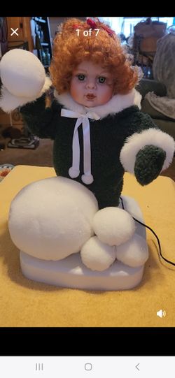 New in box...Santa's Best Animated Doll...beautiful doll playing in the snow...her head and arms move as shown in the video. 