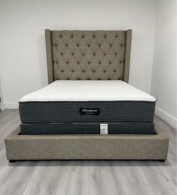 Elegant and modern Upholstered Queen size bed with Tufted Headboard. Mattress and boxspring included for free. Delivery available for an additional co