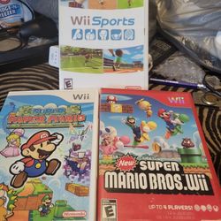 3 Nintendo Wii Games 
New Super Mario bros
Wii sports 
Paper mario
All complete