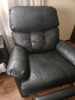 Leather Recliner And Large Leather Ottoman On Wheels