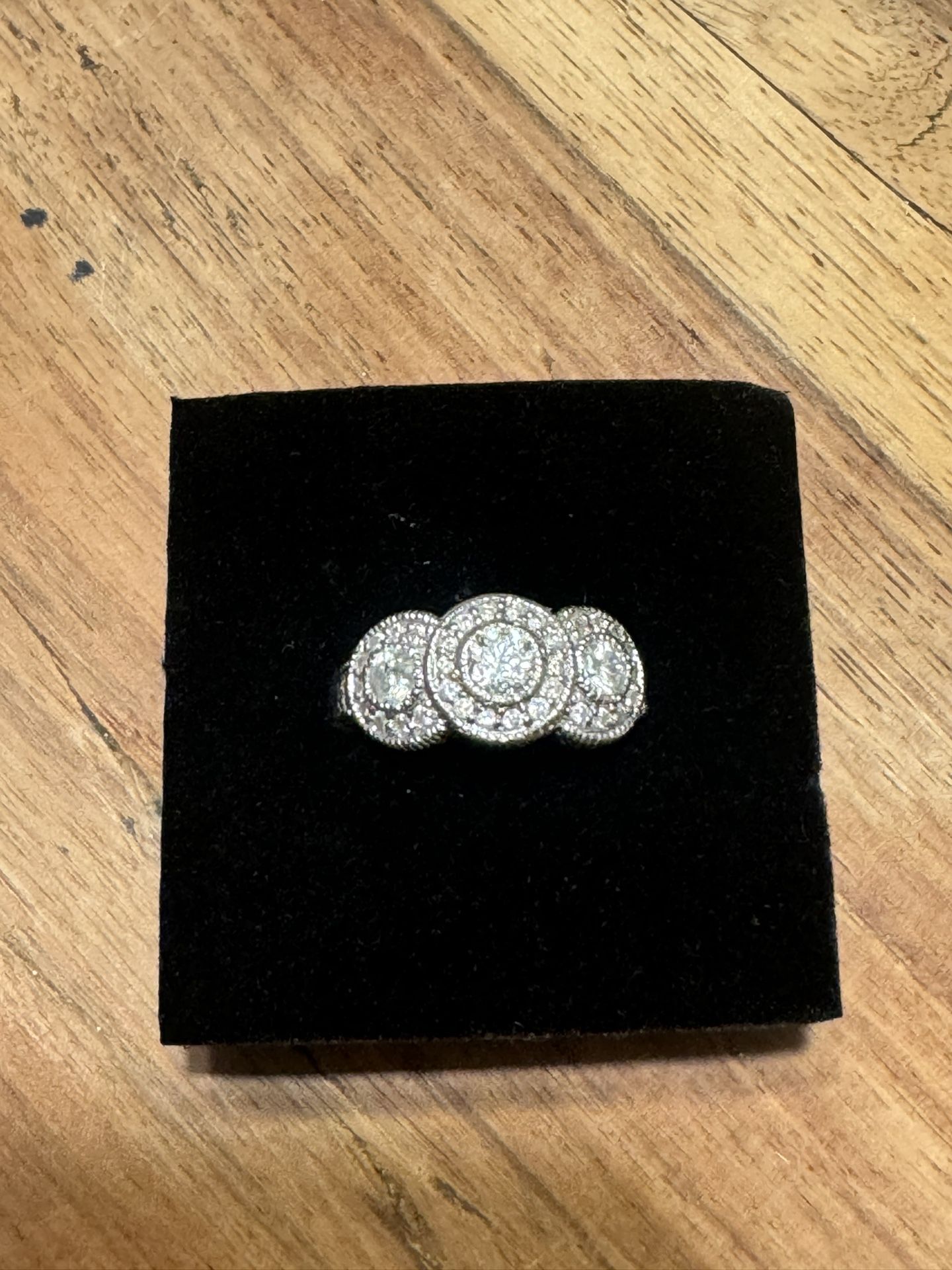 Three Stone Round Cut Diamond Ring