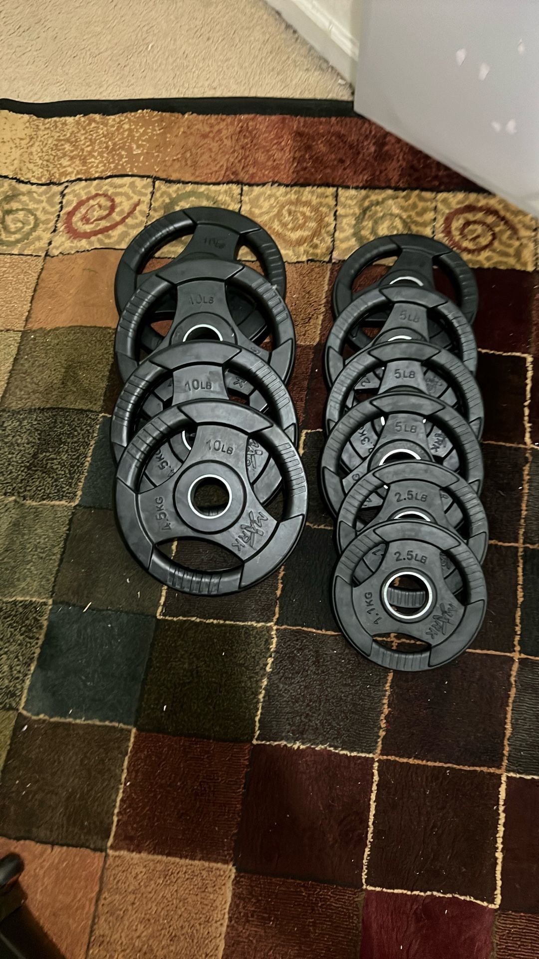 XMARK TEI-GRIP OLYMPIC WEIGHT PLATES—65lbs
