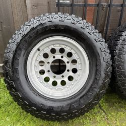 8x6.5 Wheels  265/70/16 Tires 