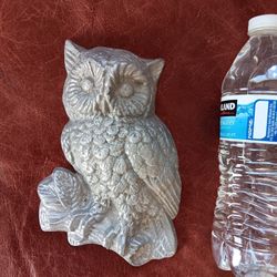 Solid aluminum owl.