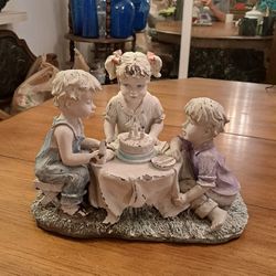Lovely Vintage Garden Decor Of 3 Children Having A Birthday Party In The Yard 12"L X 9"W X 9"H Some Paint Worn Off Due To Age See Pics 