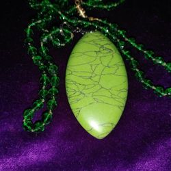Oval Green Pendant on Green Glass Beads