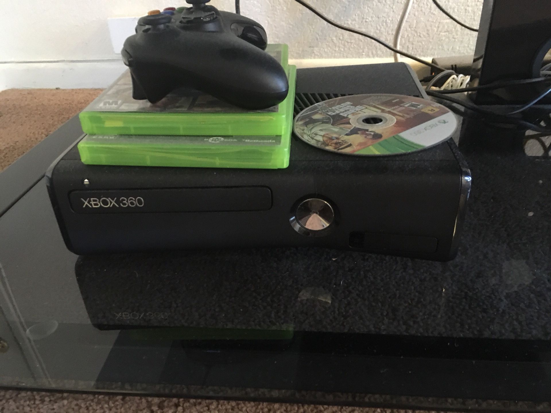 Xbox 360 with two games