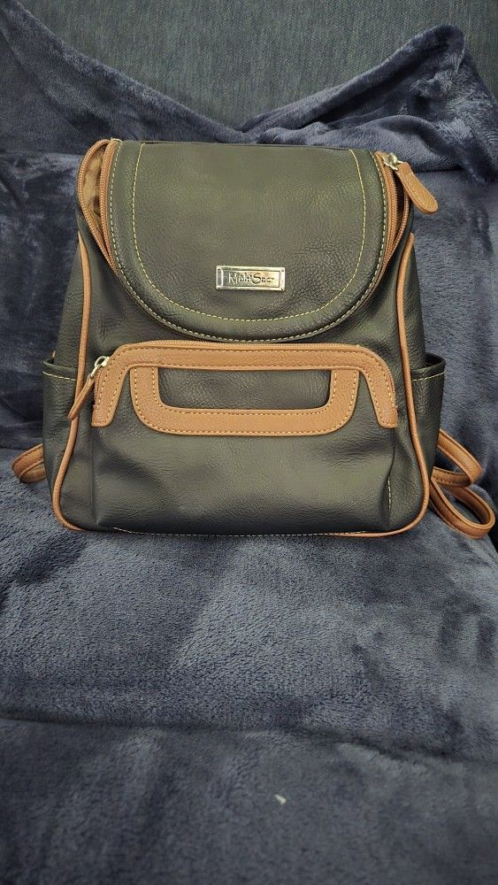 Black/brown Purse. Backpack Style