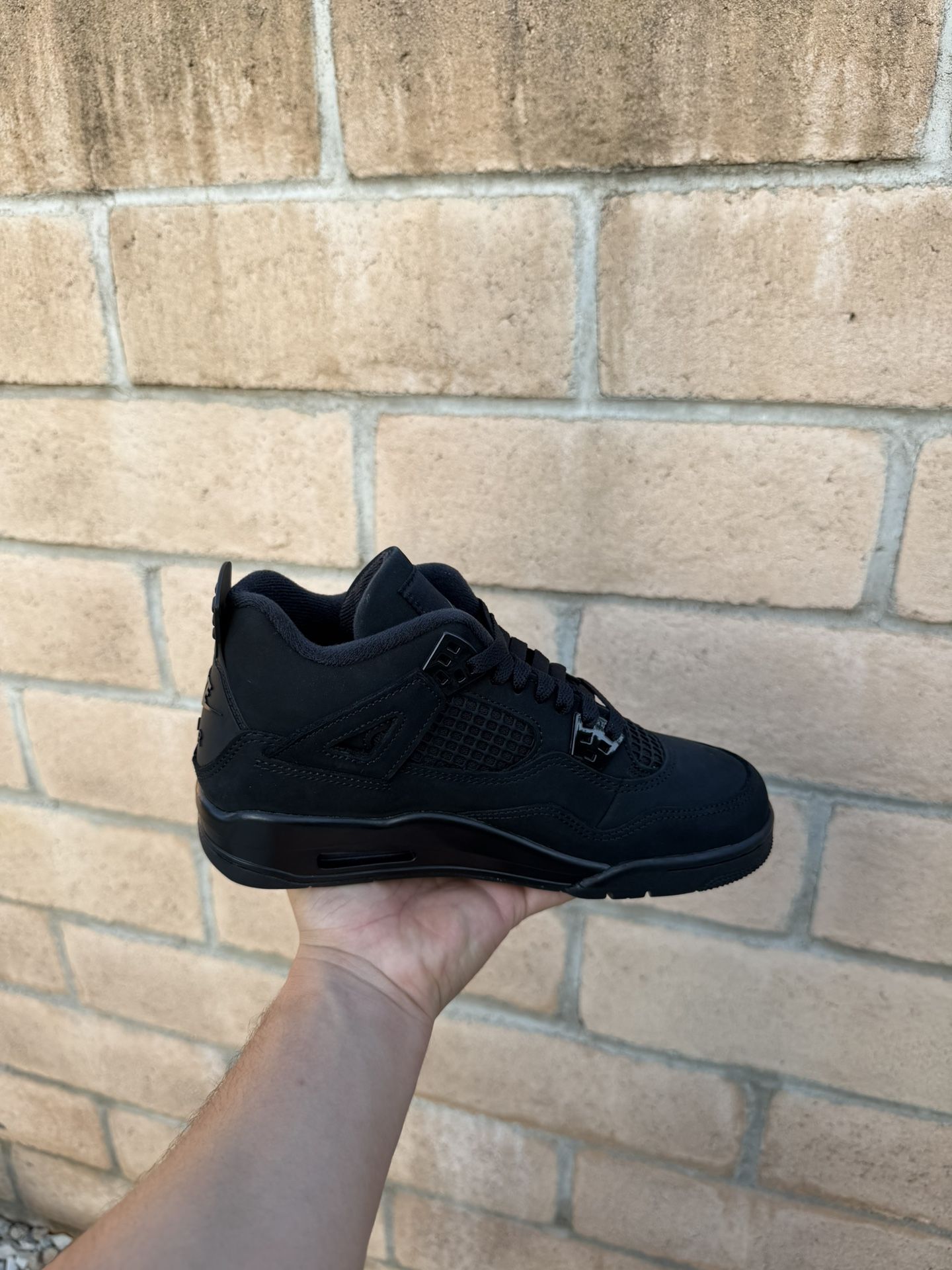 Air Jordan 4 Retro “Black Cat”