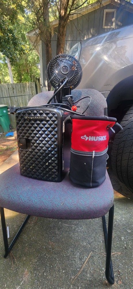 Mini portable cooler, a new Husky brand mini tool bag, and a portable ventilator used twice.