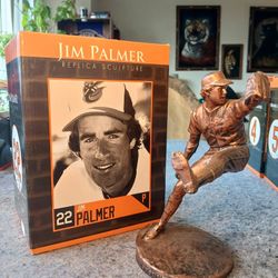The product is a replica sculpture statue of Baltimore Orioles pitcher Jim Palmer, made of bronze and officially licensed by Major League Baseball. Th
