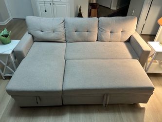 Light Gray Sectional Sofa with Pull-Out Storage