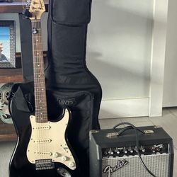 Squire electric guitar with fender amp
