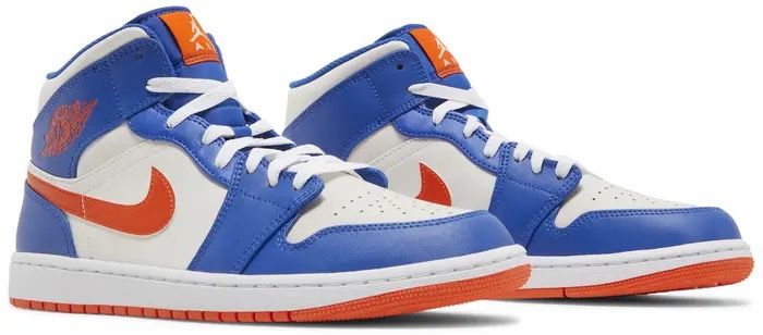 Air Jordan 1 Mid Knicks comes in a game-royal, rush orange-phantom-white color palette.