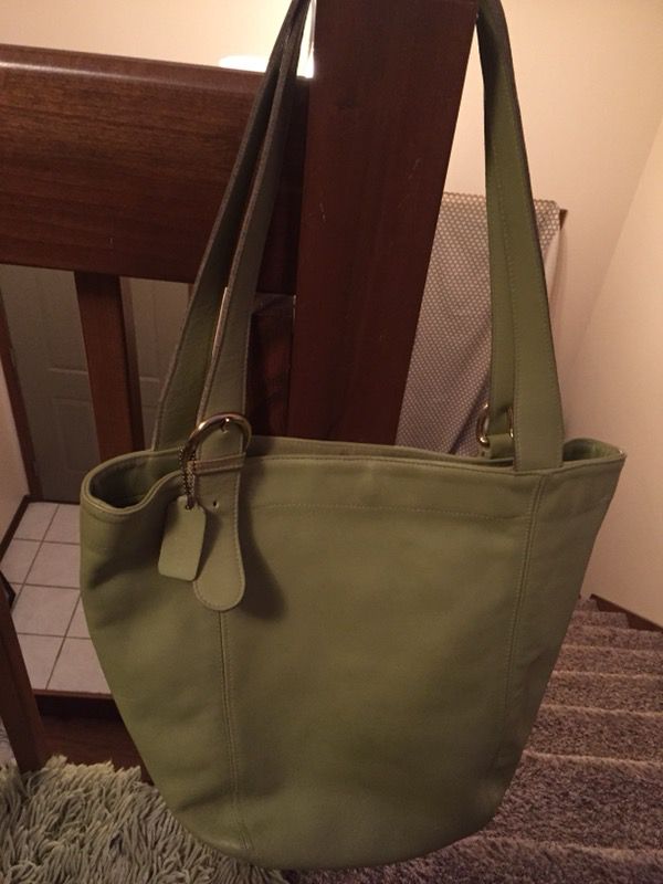 Lime green coach duffle bag, coach nearly new rain boots sz11, a Gucci over night bag nearly new and a pair of rain boots plaid really nice so 11