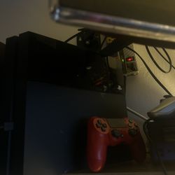 PS4 With Controller And Games