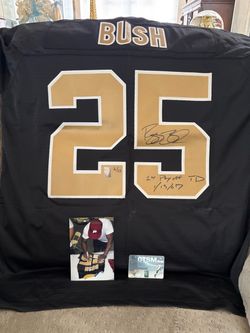 Saints- Reggie Bush autographed NFL jersey! Inscribed “1st Playoff TD”