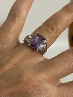 Embellate Ring: Purple Crystal with Rhodium Plating & Clear Side Stones