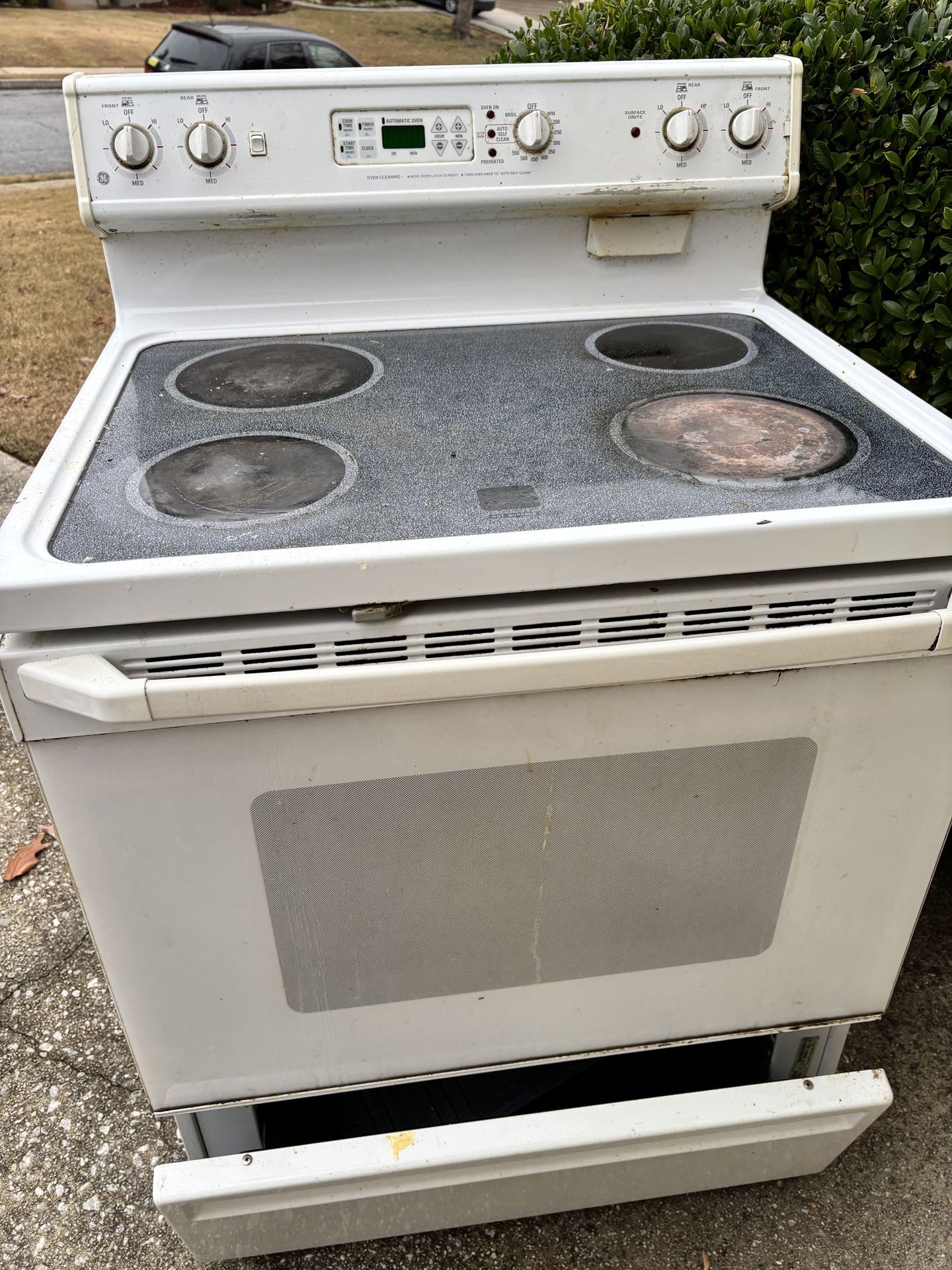 White Electric Stove & refrigerator working condition need clean and TLC