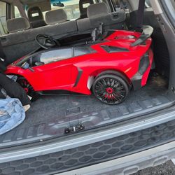 Red And Black Lamborghini Roadster