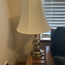💡 One brass based lamp with lamp shade and light bulb.  Measures 24”Tall with 7” Base Pet and smoke free home PU near Kennewick Walmart 