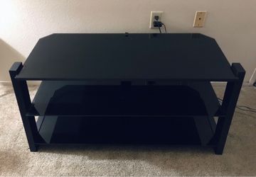 High-quality Glass top TV stand / entertainment center Please read description check out photos