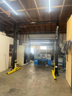 🚗 Heavy-Duty Automotive Lifts for Home Garages & Professional Shops