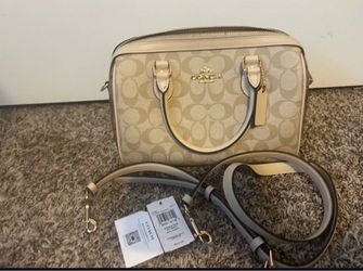 Coach sig blk rwn bag.
