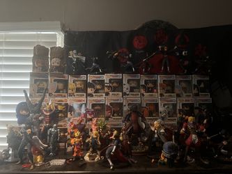 Collection Of Funkos And Figures