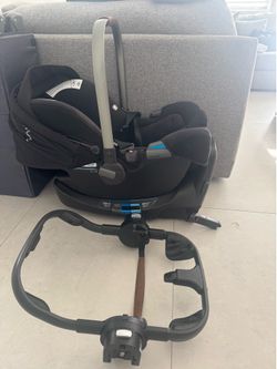 Nuna car seat, base, and stroller adapter