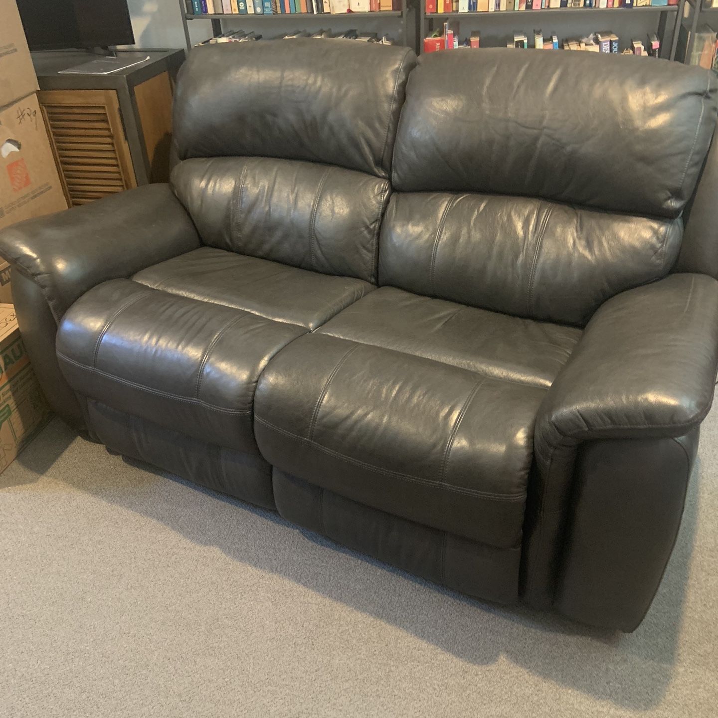 Charcoal Leather 2-seater reclining Couch.