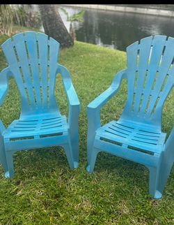 2 Blue Adirondack Chairs