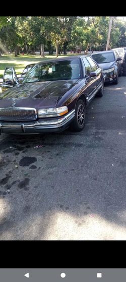 95 Buick Park Avenue supercharged, wine colored