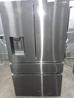 Samsung 4-door fridge brand new with manufacturers warranty