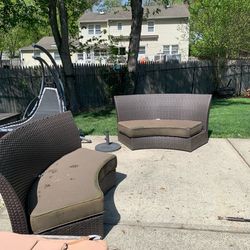 Two outdoor patio wicker sofas sunbrella cushions