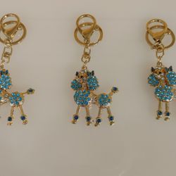 Rhinestone / Jeweled Poodle keychain ( NEW ) gold / blue _ Purse Charm. dog