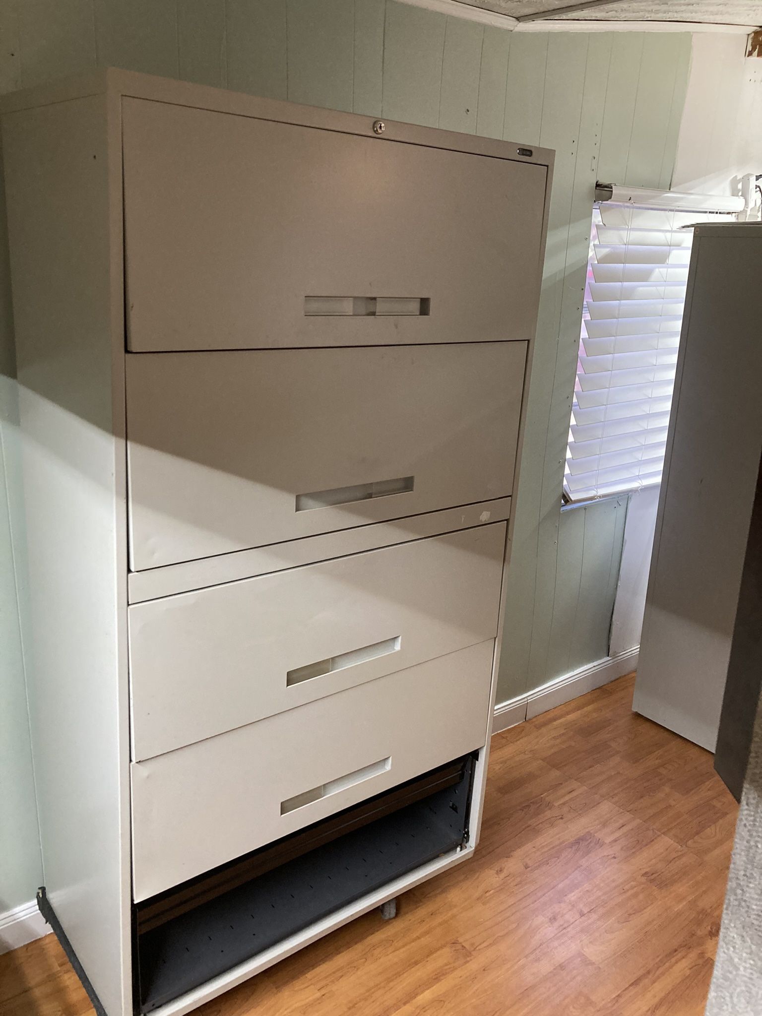Beige Filing Cabinet Doors Open Up