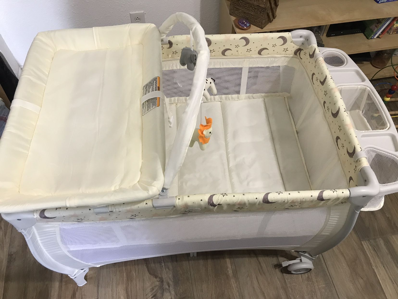 Playpen/Bassinet With Changing Table and Storage