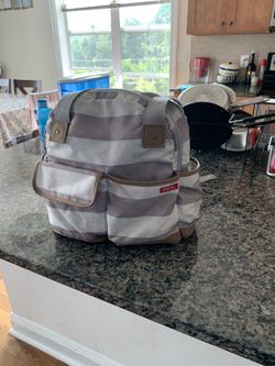 Diaper bag with changing pad