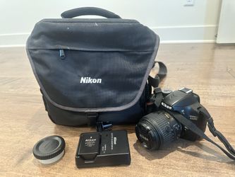 Nikon Digital Camera - Model D3200 - Comes With Case, Extra Battery Charger, Cleaning Kit