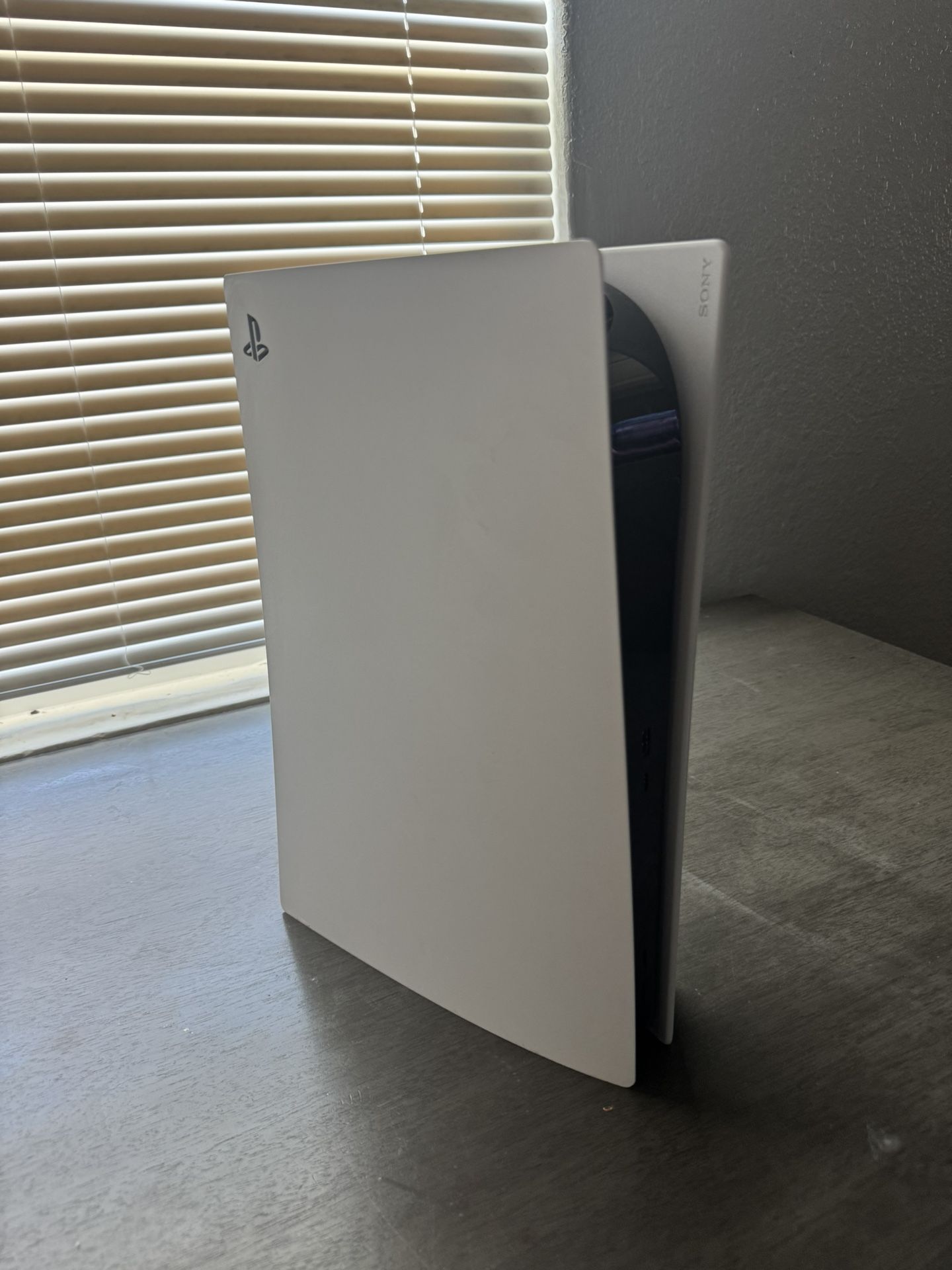 Used PlayStation 5 with disc drive (console and cables only)