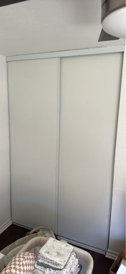 White sliding doors for closet