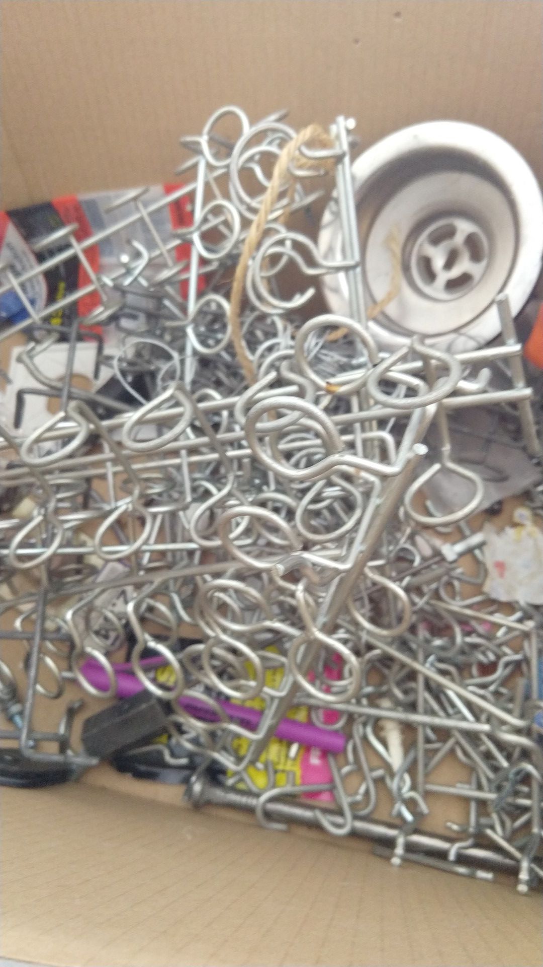 Tons of pegboard hanging clips and tool holders