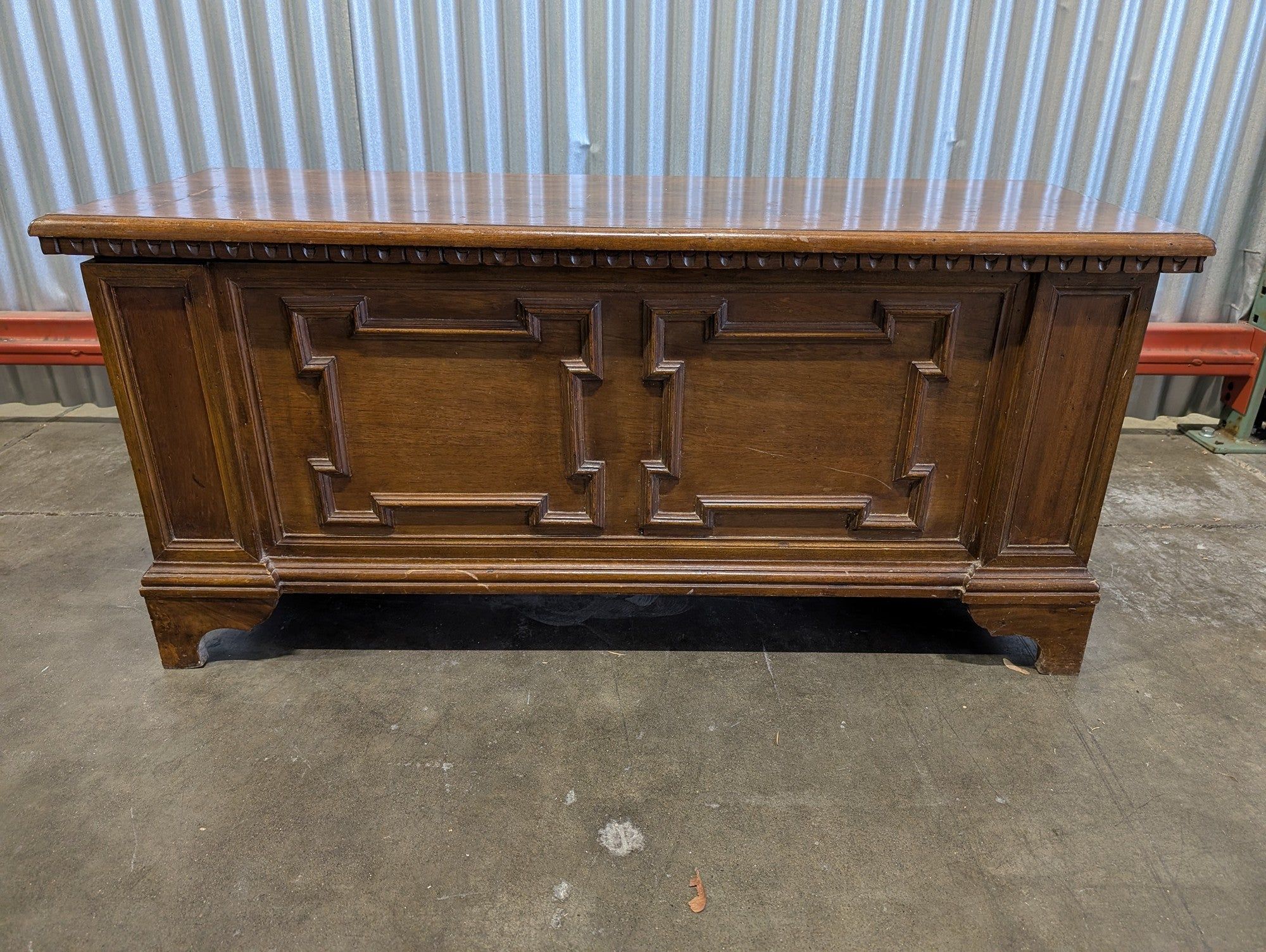Vintage Dark Wood Storage Chest with Carved Panel Design
