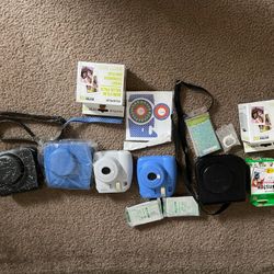 Two Polaroid Cameras