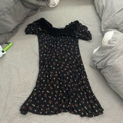 black sun dress with flowers 